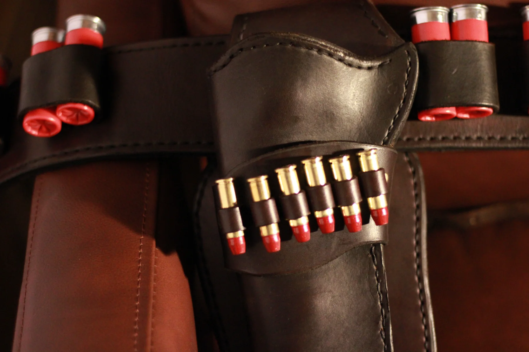 Hand-sewn cartridge loops on a western gun belt